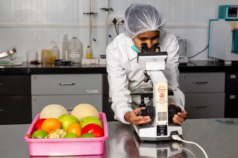 Scientist analysing fruit samples in the Sahyadri Farms laboratory